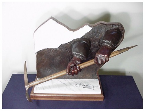 Sir Edmund Hillary holding a climbers axe